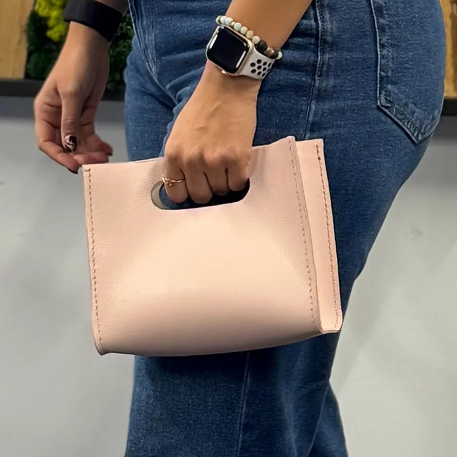 Pink Smooth Matte Curved Mini Handheld Clutch With Integrated Oval Cut-Out Grip Handle And Matching Edge Stitched Panel Detailing Handbag