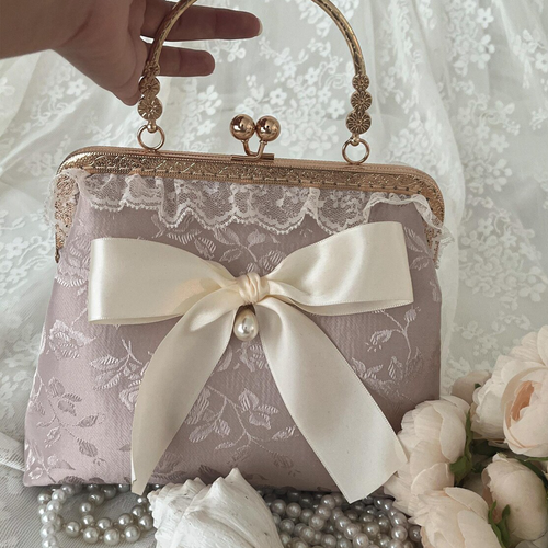 Champagne Floral Jacquard Kiss-Lock Frame Handheld Clutch With Ruffled Lace Trim, Cream Satin Pearl Accent Bow And Engraved Golden Metal Top Handle Hardware Handbag