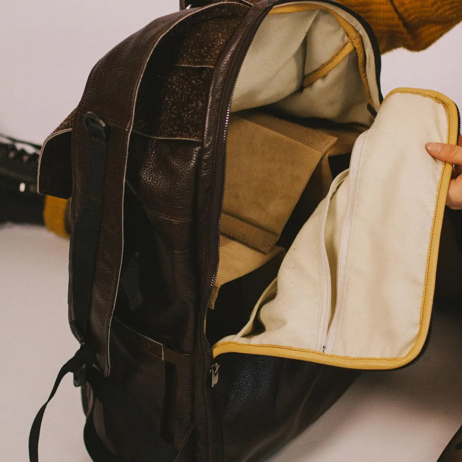 Brown Grained Textured Flap Backpack With Removable Modular Interior Dividers, Wide Front Slip Pocket And Integrated Top Grip Handle Hardware Camera Bag