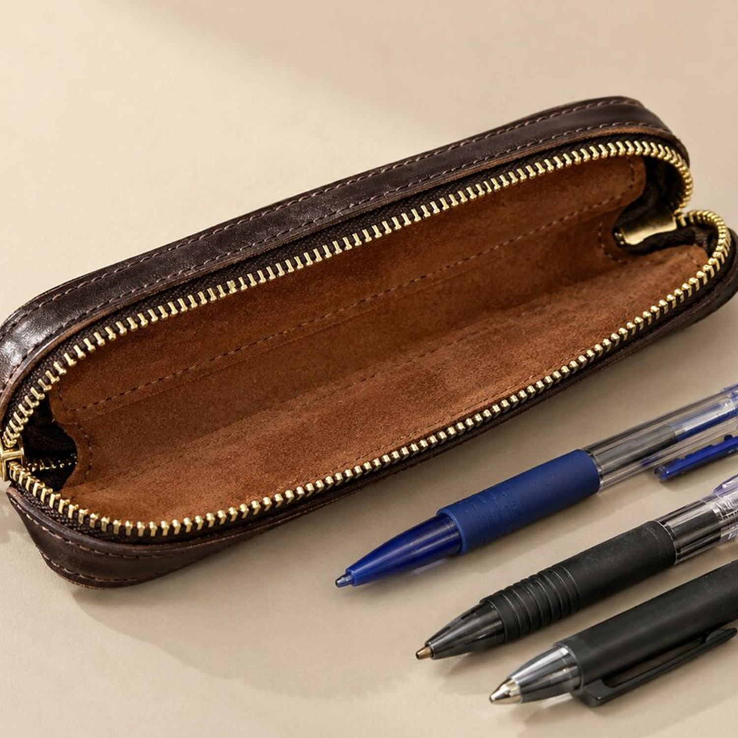 Slim Elongated Stationery Sleeve With Contrast Hand Stitched Edging, Full-Length Brass Zip Closure And Soft Fuzzy Interior Lining For Writing Tool Storage