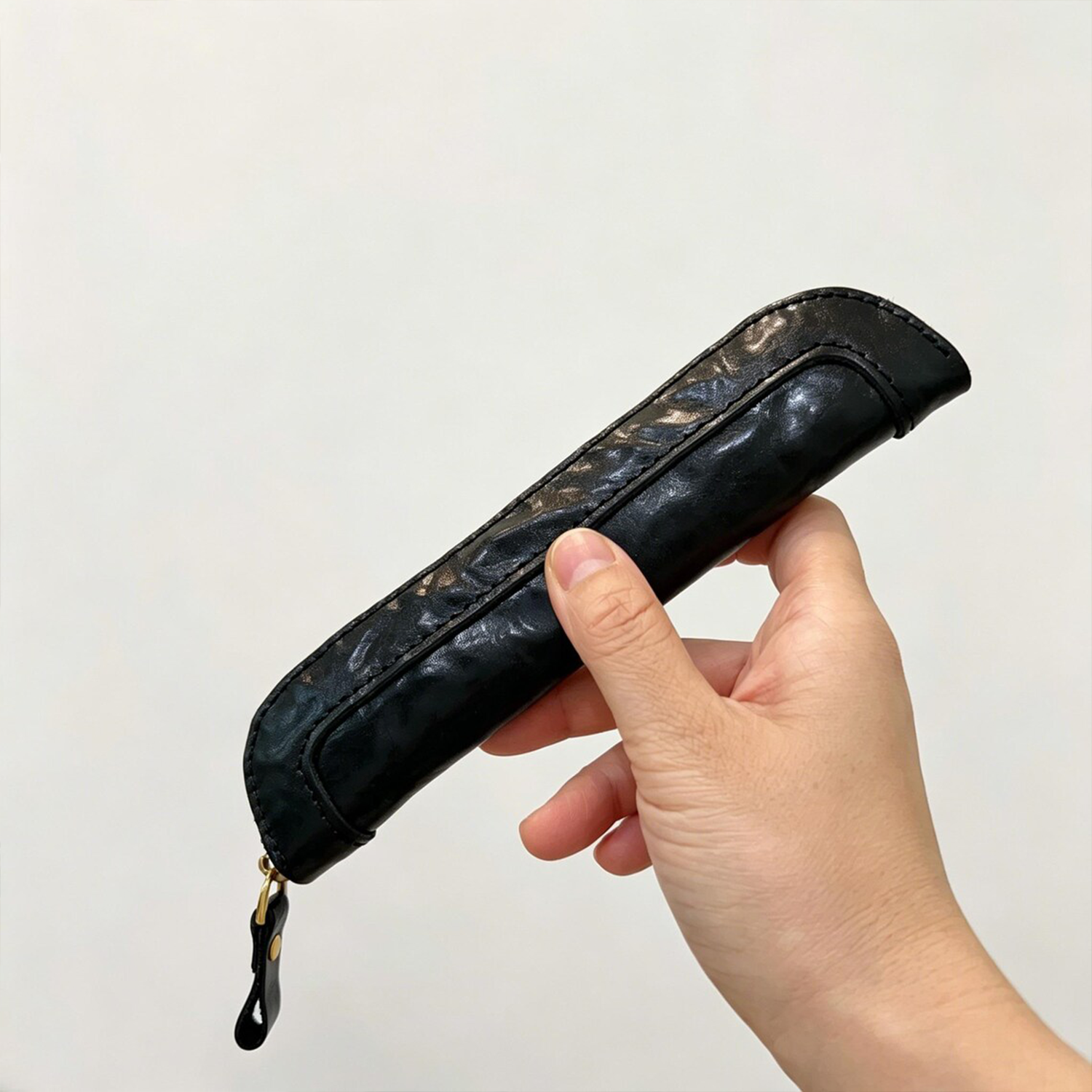 Slim Elongated Stationery Sleeve With Contrast Hand Stitched Edging, Full-Length Brass Zip Closure And Soft Fuzzy Interior Lining For Writing Tool Storage