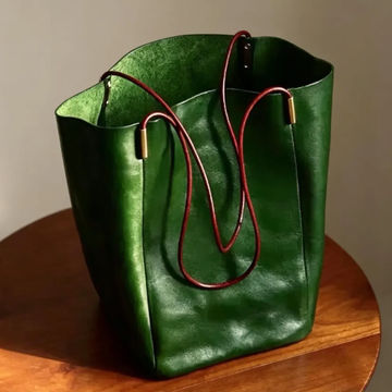 Forest Green Glossy Vertical Bucket Shoulder Tote With Contrast Burgundy Cord Loop Straps, Gold Tube Metal End Caps And Large Unpartitioned Open Storage Cavity