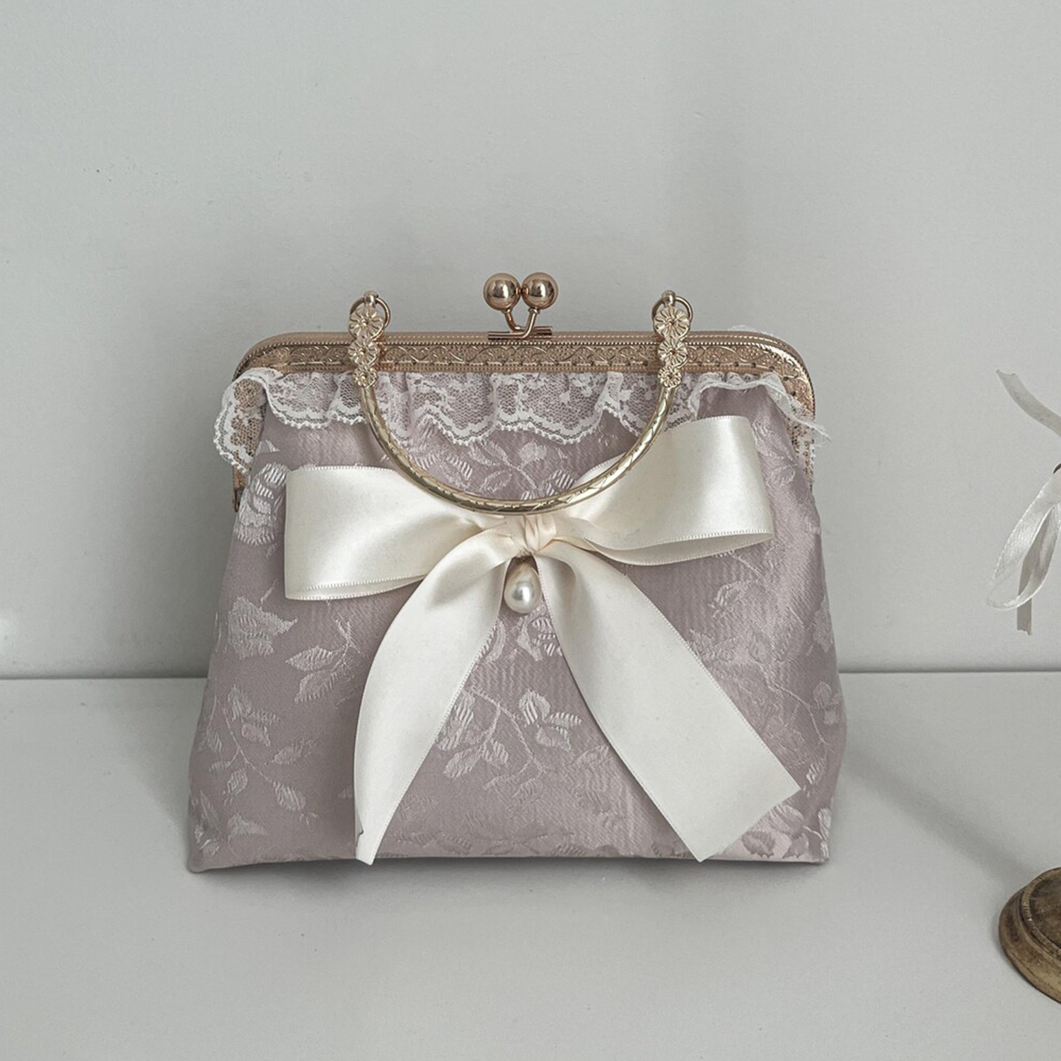Champagne Floral Jacquard Kiss-Lock Frame Handheld Clutch With Ruffled Lace Trim, Cream Satin Pearl Accent Bow And Engraved Golden Metal Top Handle Hardware Handbag